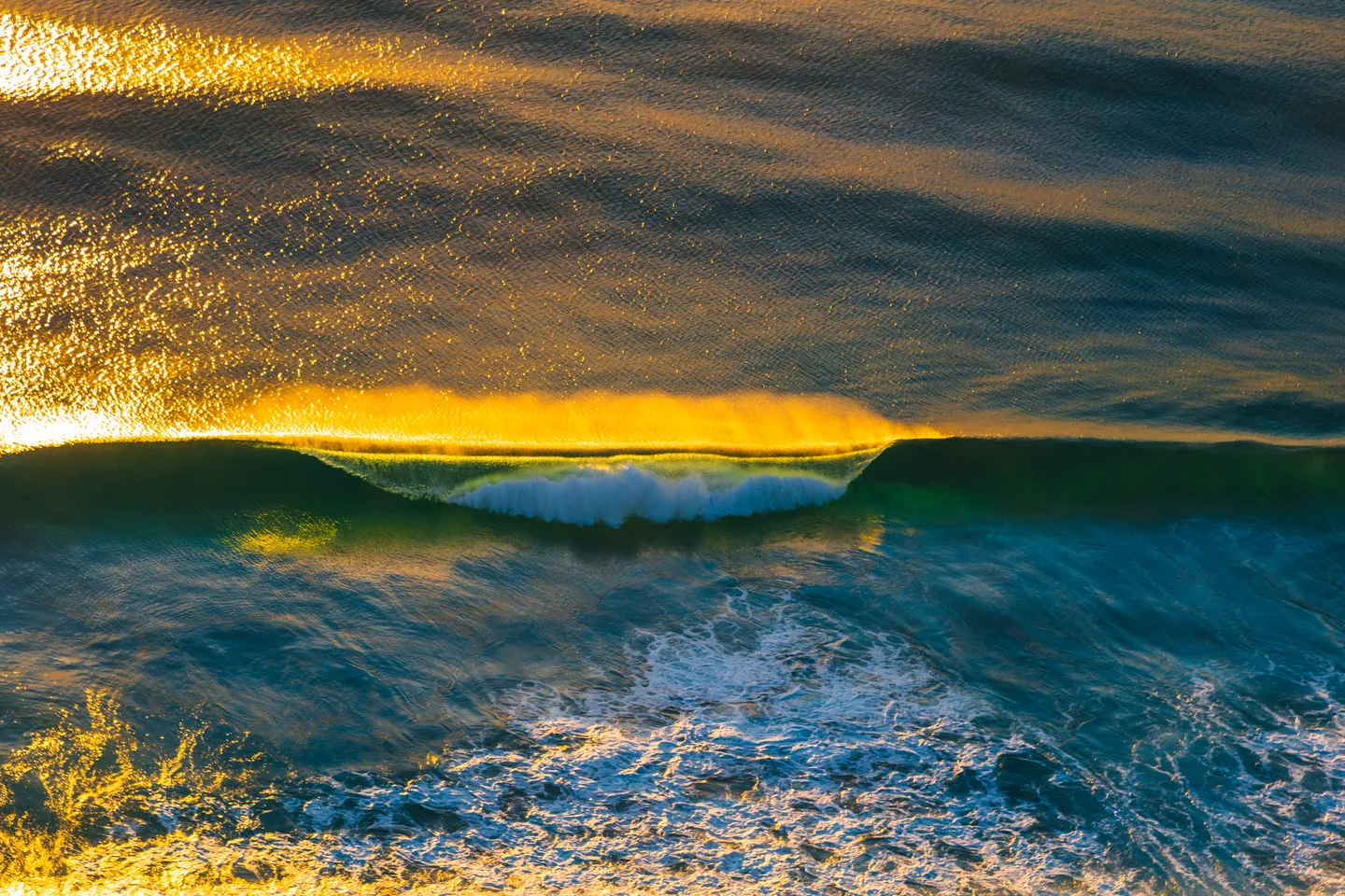 Golden light over the ocean at nearby Burleigh Heads